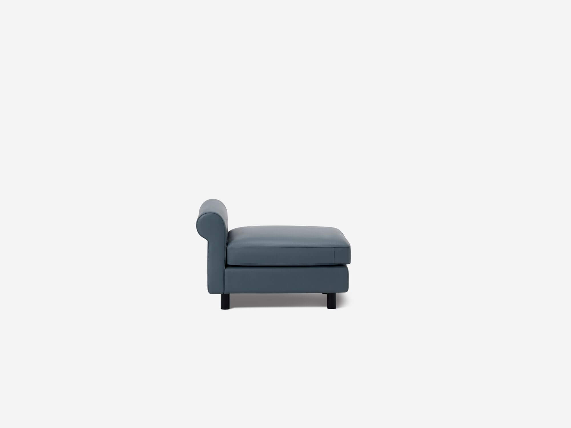 Side view of blue leather accent chair